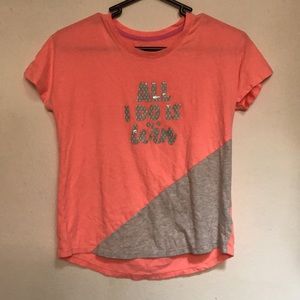 A pink and grey shirt LG 10-12